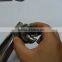 Manual crimping machine for perfume bottle cap