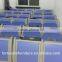 blue bent plywood seat and back lecture hall folding chair