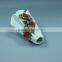 White glaze type style porcelain flower vase with red petals
