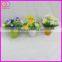 artificial small potted plant with plastic pot