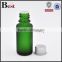 2017 high quality 15ml oil glass bottle green round shape oil glass bottle silver cap oil glass bottle with stopper