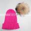Rose color top grade winter acrylic beanies with large natural fur ball