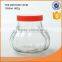 Wholesale high quality glass storage jar with colored plastice lid