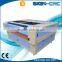 Prefessional Co2 lasre cutter machinery/ auto feeding fabric leather clothes laser cutting machine