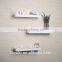 3 Shelves Wooden Rounded Floating Cube Wall Shelves with the letter