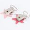 Colorful suspender clips with plastic teeth