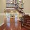 arc curved stairs with metal railing and thick wood stair tread