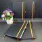 black emboss cover mole skin notebook with two ribbons