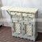 Wooden folding ironing board with cabinet