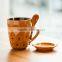 White ceramic coffee mug with dot
