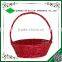 Hand woven red wicker gift basket for christmas
