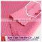 Polyester crinkle puckered fabric with wicking finish