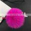 Handmade fox fur ball keychain with leather strap