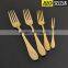 Gold plated flatware with rose design and wooden box