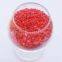 Rubber and plastic particles for plastiorcoated compensation chain