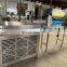 Coating machine in snack food production, biscuit spreading machine with chocolate cooling tunnel