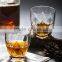 clear glass cup with machine made lotus pattern for drinking
