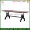 Adjustable height wooden dining table with metal legs
