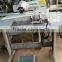 Compact short-arm blind stitch sewing machine without skip stitch device