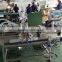 Automatic shampoo bottle filling machine with conveyor