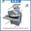 Dough dividing and rounding machine