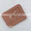 Special craft 3D effect rubber brand logo on PU fake leather