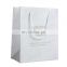 Black embossed gold logo paper shopping bag with handle