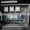 SY-102 PLC servo tray-arraying machine for food