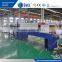 Automatic PE film wrapping and shrinkage machine
