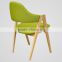 green color fabric indoor wood chair
