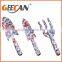Metal mini spades and rake for kids for gardening using