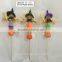 Straw and fabric scarecrow with pumpkin for Halloween decoration