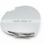 Oval compact mirror and pocket compact