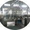Juice bottle filling and sealing machine