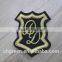 Embroidery emblem with adhesive for worker uniform
