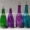 glass wine bottle candle holder with LED string lights