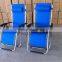 Folding beach chair with headrest