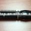 Retractable comb electronic comb hair curling iron