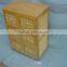 wooden storage cabinet with natural wicker basket drawer