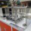 PVC cylinder lid/bottom flying cutter machine for plastic cylinder