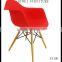 Red DSW wooden chairs with arms