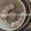 Blush color pompom Vietnam folding seagrass basket, natural color