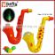 Promotional plastic saxophone candy toy with flash light