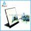 unframed small standing table mirror