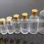 Small wine glass bottle with golden lid odd-shaped glass wine bottle