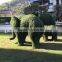 Fiberglass elephant sculpture with artificial grass