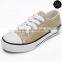 In stock gold canvas shoe woman