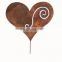 Outdoor rusty heart shaped metal sheet cutting crafts for kids