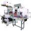Automatic sleeve wrapper and PE thermal shrink packing machine