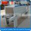 Shrink tunnel wrapping machine